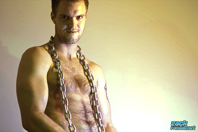 Billy Club teases with sexy poses and soft lighting in a hot gym shoot