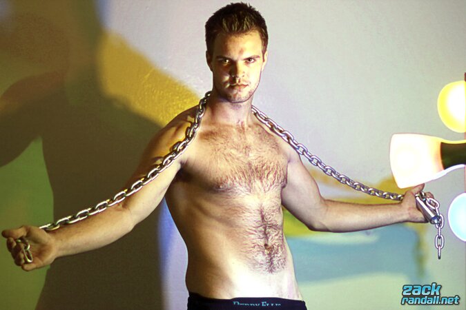 Billy Club teases with sexy poses and soft lighting in a hot gym shoot