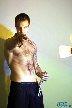 Billy Club teases with sexy poses and soft lighting in a hot gym shoot