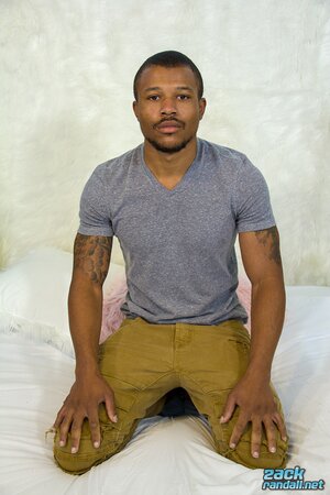 Chris strokes his big dark dick and shoots a thick load in the bedroom