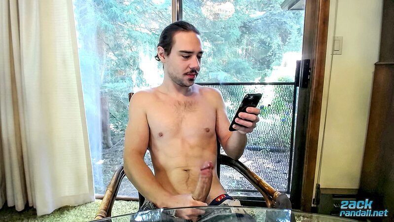 Long-haired Zack Randall licks his cock and jerks off to a big cum shot