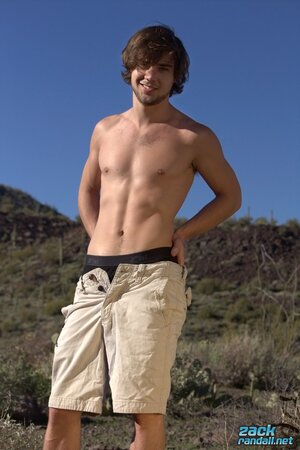 Zack Randall scares the wildlife as he jerks off and cums on his abs