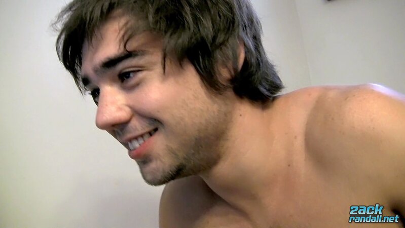 Zack Randall pisses on himself and sucks his cock in a wet bathroom show