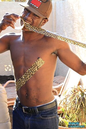 Moe Johnson wanks his big black cock outdoors
