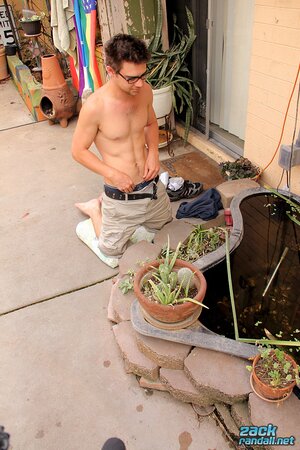Zack Randall sucks his own cock in the garden
