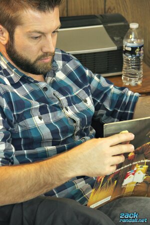 Bearded hunk Jason jerks off to pussy mags and swings his nuts around