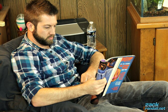 Bearded hunk Jason jerks off to pussy mags and swings his nuts around