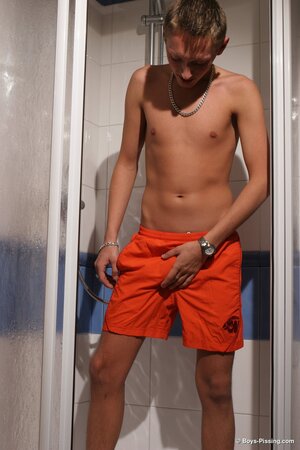 Shy twink Veso takes on a long bathroom pissing challenge