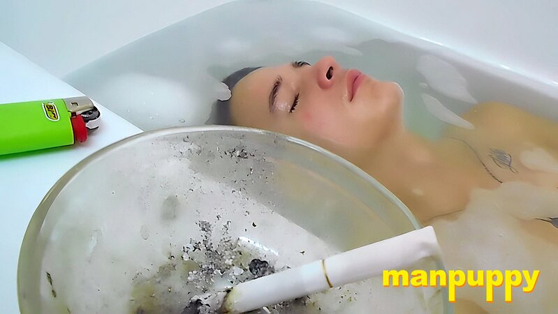 Tristan Sweet relaxes in bubbles, blowing smoke and teasing himself