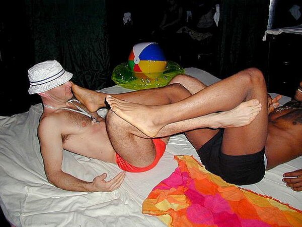 Lamar and John’s foot fetish and muscle play heats up the faux beach