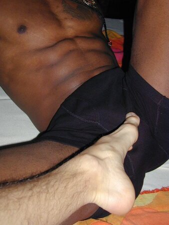 Lamar and John’s foot fetish and muscle play heats up the faux beach