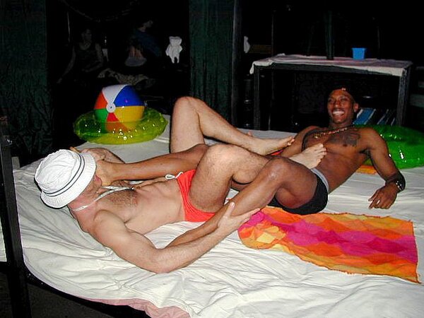 Lamar and John’s foot fetish and muscle play heats up the faux beach