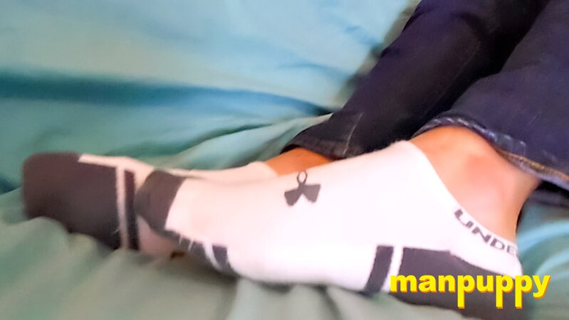 Giant nerd Travis Smith bats you away as you crawl toward his smelly socks