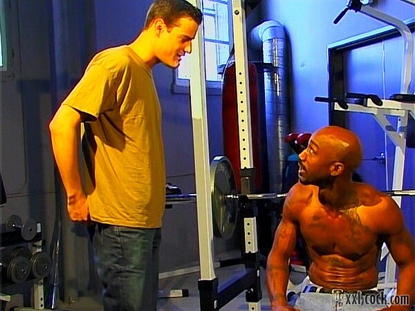Brandon Tamarin bends over to take Bam’s big black cock deep inside