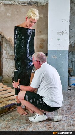 Ricky Vilela is wrapped in plastic and edged by Sebastian Kane