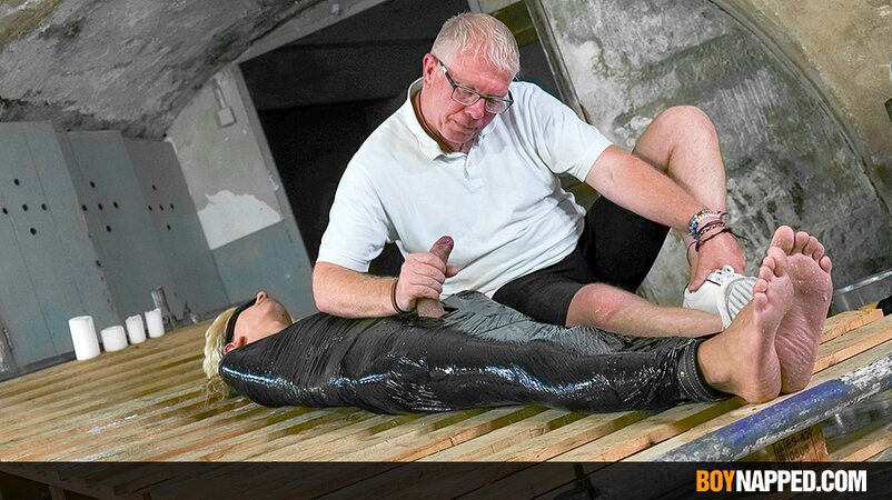 Ricky Vilela is wrapped in plastic and edged by Sebastian Kane