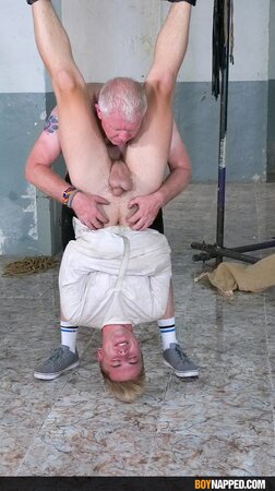 Master Kane ties Jamie Kelvin in a straight jacket and fucks him