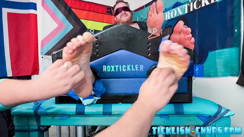 Ryan giggles and squirms under Matt’s tickling fingers