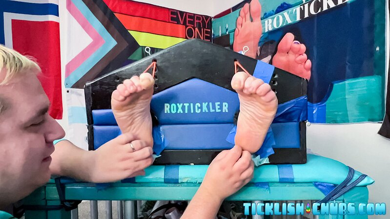 Ryan giggles and squirms under Matt’s tickling fingers