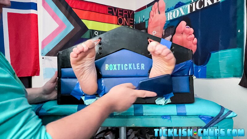 Ryan giggles and squirms under Matt’s tickling fingers
