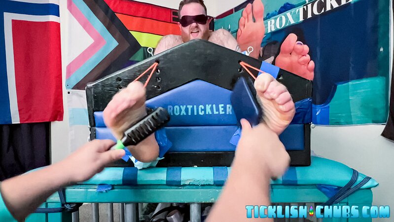 Ryan giggles and squirms under Matt’s tickling fingers