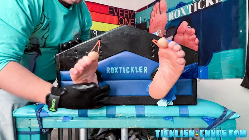 Ryan giggles and squirms under Matt’s tickling fingers