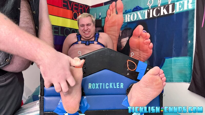 Ryan’s tickling makes Matt giggle and arch his chubby body