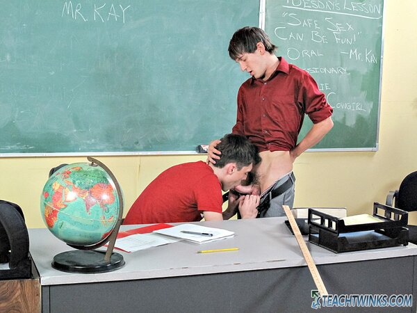 Andy Kay sucks Maddox Johnson’s cock in the classroom