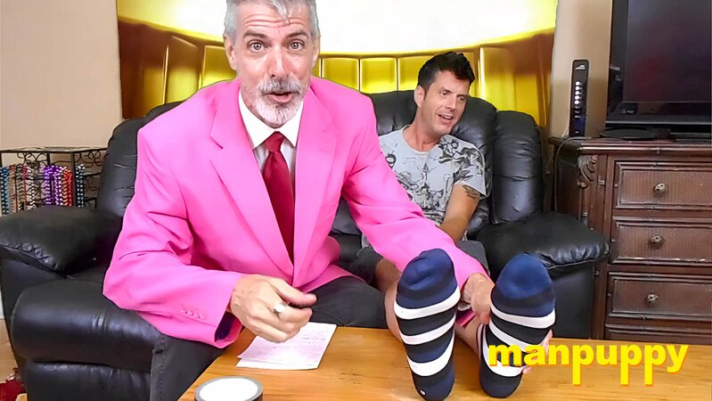 Richard Lennox tickles Jeff Drizzle’s feet on sofa