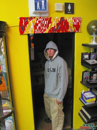 Solo jock Evan Heinze teases with baggy pants