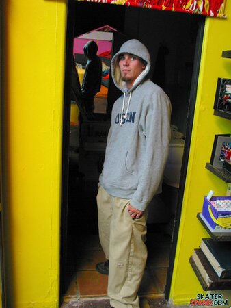 Solo jock Evan Heinze teases with baggy pants