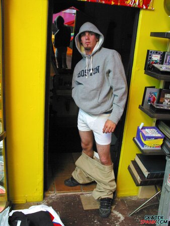 Solo jock Evan Heinze teases with baggy pants