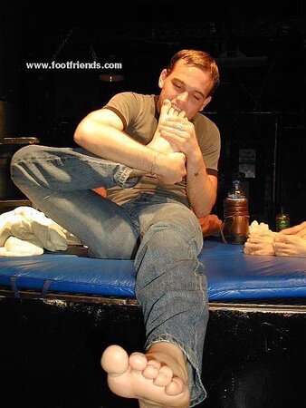Ethan’s feet worshipped by Coby and Eugene at party