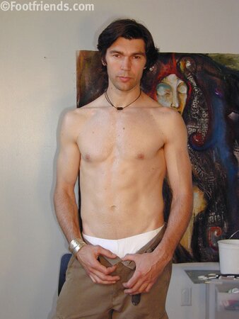 Raimondo poses with painting in foot fetish debut