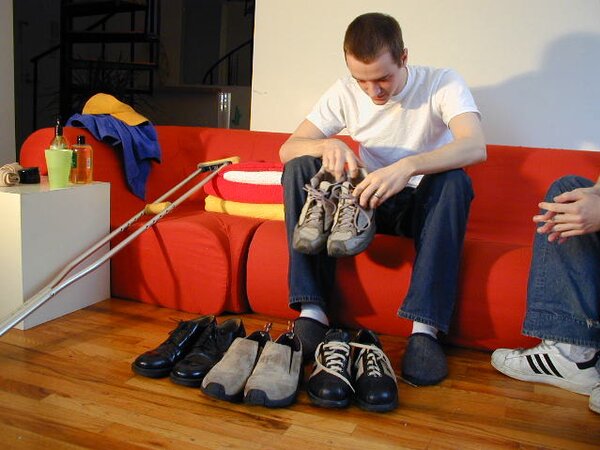 Brian Francis tries on shoes and models sexy socks for foot fetish fans