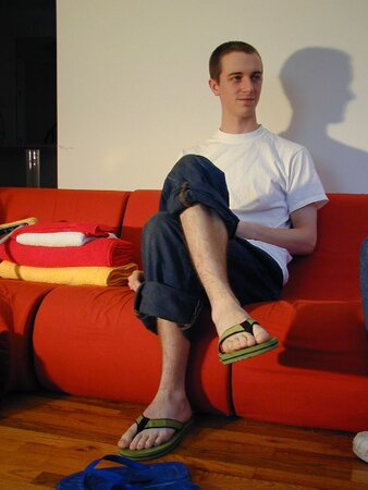 Brian Francis tries on shoes and models sexy socks for foot fetish fans