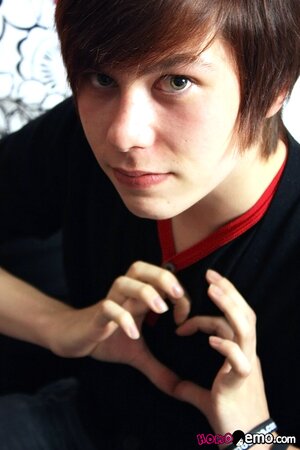 Emo twink Jack Styles strokes his uncut cock in natural bedroom setting