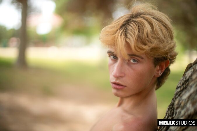 Young twink Tyler Moore strikes sensual poses in slick solo photoshoot