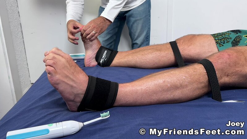 Joey J tied to tickling table begging after intense electric toothbrush play