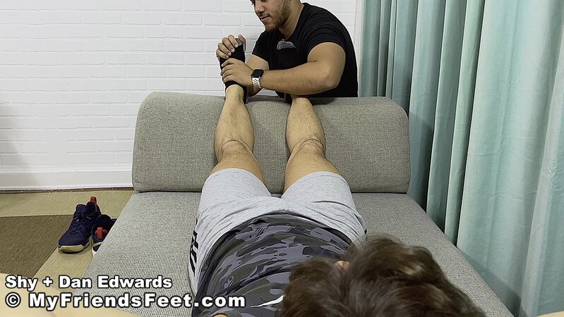 Shy moans under foot play then Dan Edwards slides in and fucks him