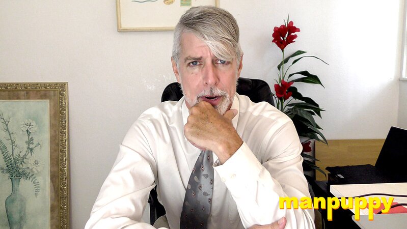 Richard Lennox plays with his cock under his suit in private