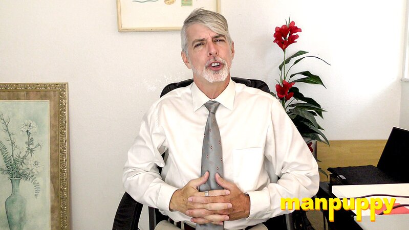 Richard Lennox plays with his cock under his suit in private