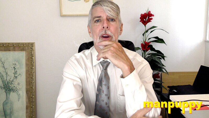 Richard Lennox plays with his cock under his suit in private