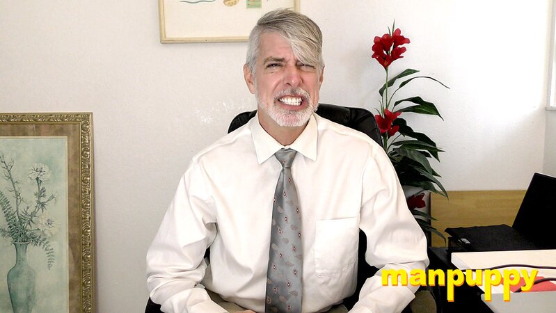 Richard Lennox plays with his cock under his suit in private