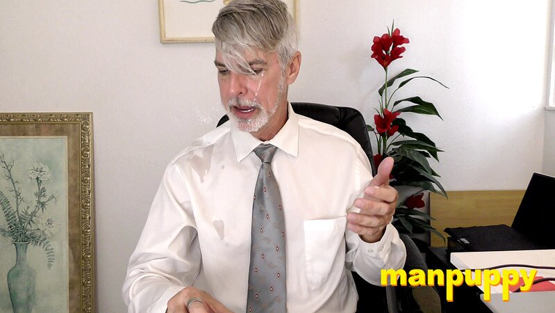 Richard Lennox plays with his cock under his suit in private