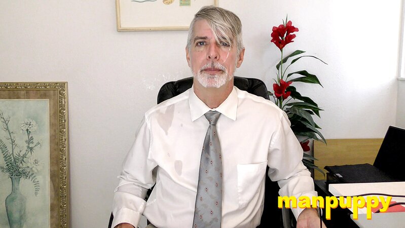 Richard Lennox plays with his cock under his suit in private