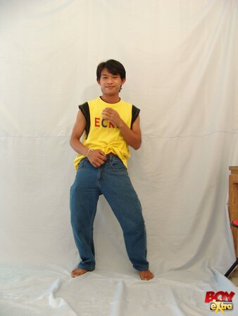 Asian twink fingers his hole then strokes his thick cock