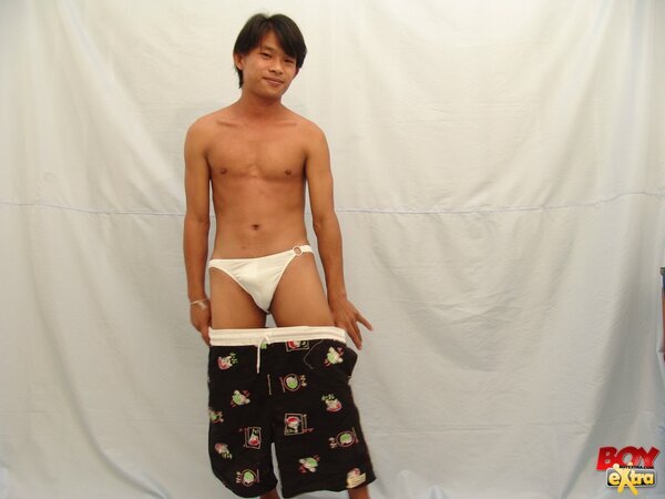 Asian twink fingers his hole then strokes his thick cock