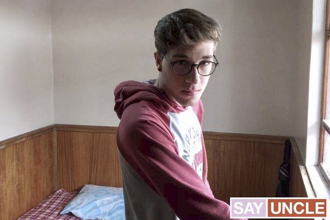 Latino twink Arthur Joseph jerks off and swallows in smooth bedroom shoot