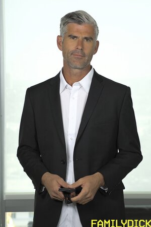 Harlen Quindel bends for Bill Farnsworth's rough bareback curing cold feet